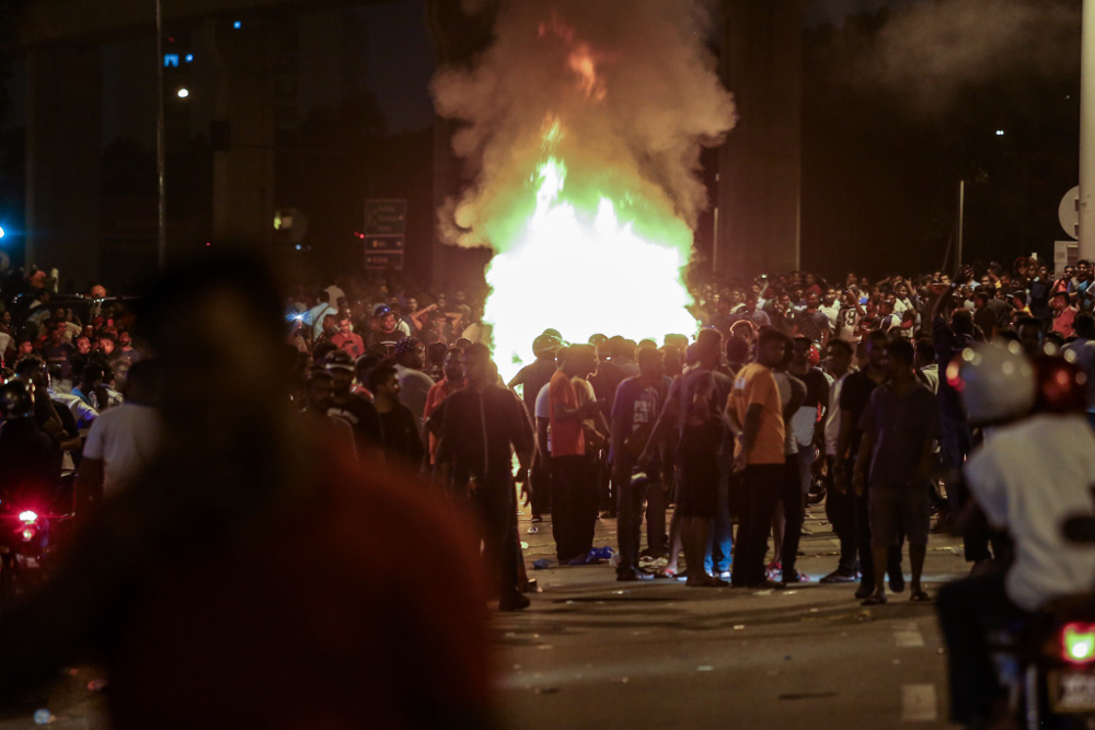 Several car wreckages were torched by the protesters that have gathered near the Sri Maha Mariamman temple compound as the protest enter its second day November 27, 2018. u00e2u20acu201d Picture by Hari Anggara 