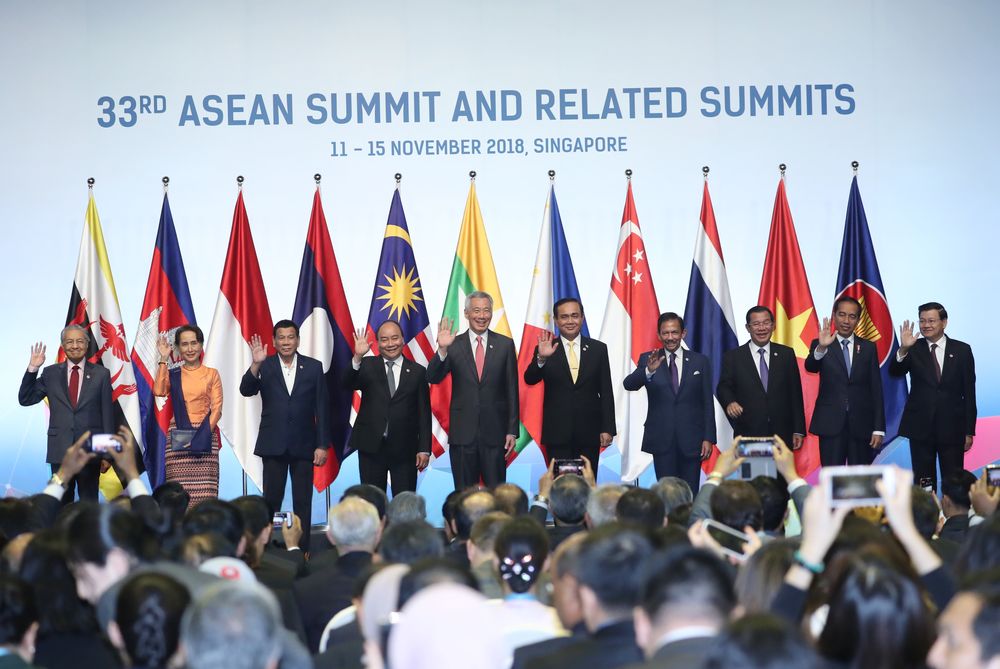 Prime Minister Mahathir Mohamad and Myanmar State Counsellor Aung San Suu Kyi join other leaders for a group photo at the opening ceremony at the 33rd Asean summit November 13, 2018. u00e2u20acu201d Picture courtesy of Singapore Ministry of Foreign Affairs