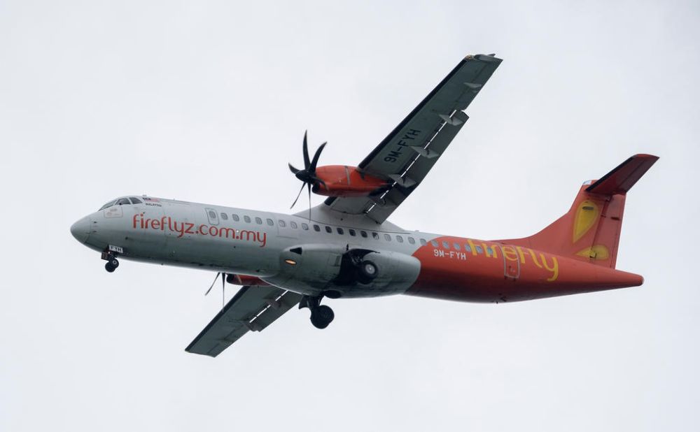 A Firefly ATR 72-500 airplane approaches to land at Changi International Airport in Singapore. u00e2u20acu201d Reuters pic