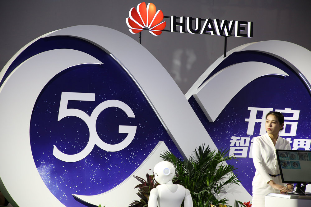 A woman stands at the booth of Huawei featuring 5G technology at the PT Expo in Beijing, China September 28, 2018. u00e2u20acu201d Reuters pic