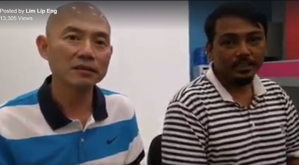 A screenshot of a video showing the man apologising to the victim of his harassment and Malaysians in general.