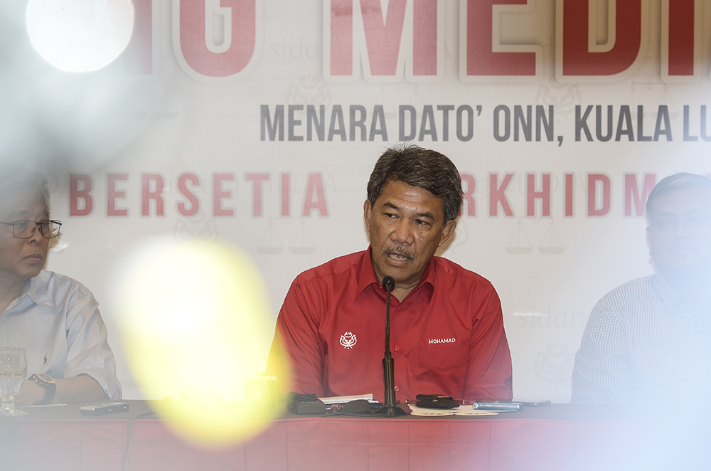 Datuk Seri Mohamad Hasan chairs an Umno Supreme Council meeting in Kuala Lumpur December 21, 2018. u00e2u20acu201d Picture by Miera Zulyana