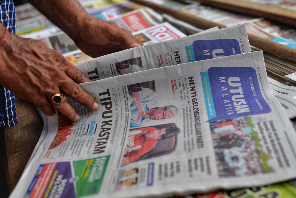 Copies of the Utusan Malaysia newspaper at a stall in Sungai Besi, Kuala Lumpur December 22, 2018. u00e2u20acu201d Picture by Shafwan Zaidon