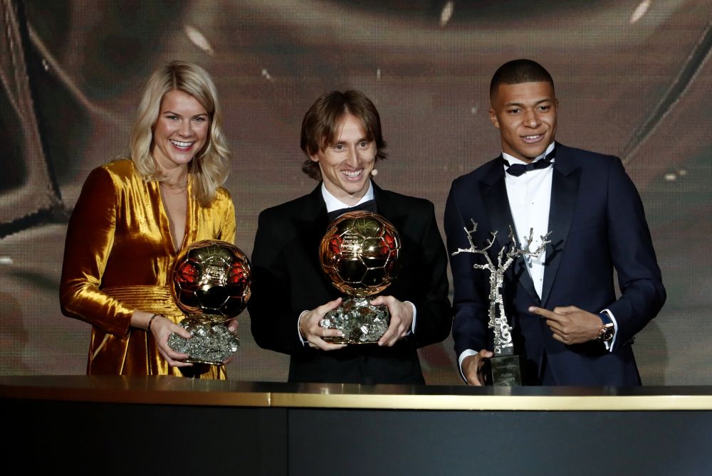 Real Madrid's Luka Modric, Olympique Lyonnais' Ada Hegerberg and Paris St Germain's Kylian Mbappe pose with their awards. u00e2u20acu201d Reuters pic