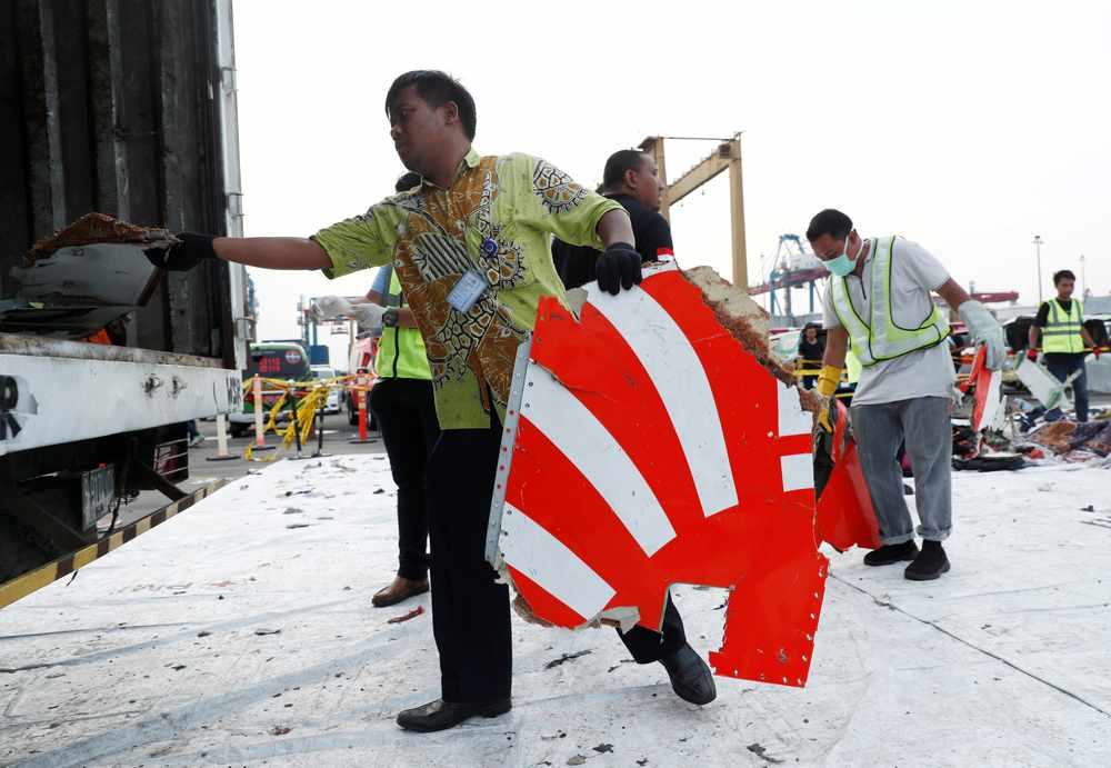Workers load up recovered debris and belongings believed to be from Lion Air flight JT610 onto a truck at Tanjung Priok port in Jakarta November 2, 2018. u00e2u20acu201d Reuters pic