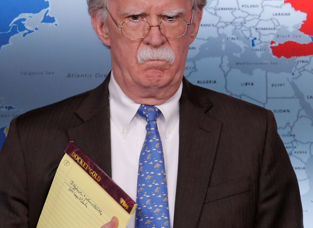 US National Security Adviser John Bolton holds a pad of note paper with a note reading u00e2u20acu02dc5,000 troops to Colombiau00e2u20acu2122 as he waits to address reporters at the White House in Washington, January 28, 2019. u00e2u20acu201d Reuters pic