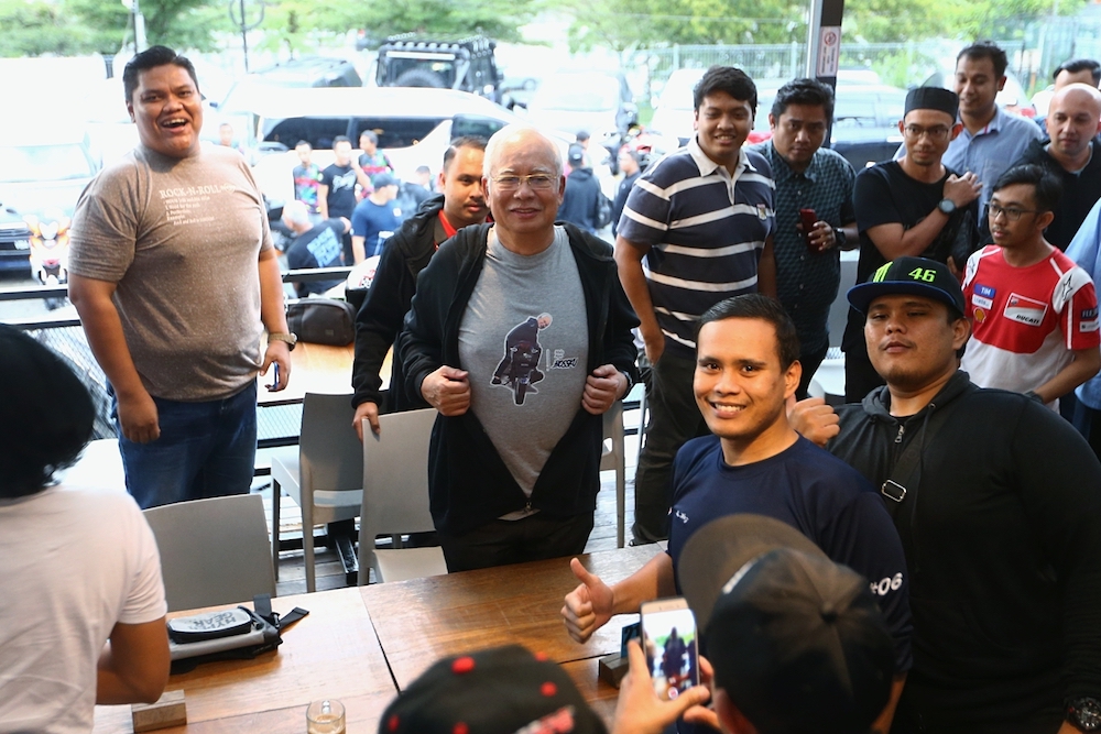 Datuk Seri Najib Razak mingles with motorcycle enthusiasts at the Podium in Kuala Lumpur January 20, 2019. u00e2u20acu201d Picture by Ahmad Zamzahuri