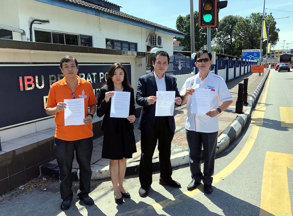DAP lawmaker Chong Zhemin lodged a police report at Ipoh police headquarters here against MCA for receiving stolen funds amounting RM16.5 million from 1MDB. u00e2u20acu201d Picture by Chong Zhemin