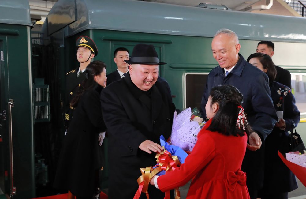 This January 8, 2019 picture released by North Koreau00e2u20acu2122s official Korean Central News Agency (KCNA) January 10 shows Kim Jong-un receiving a bouquet of flowers from a Chinese girl on his arrival at the Beijing station. u00e2u20acu201d KCNA via KNS via AFP pic