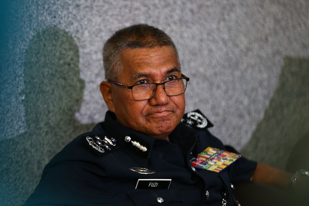 Tan Sri Mohamad Fuzi Harun speaks to reporters after the monthly assembly at Bukit Aman in Kuala Lumpur January 16, 2019. u00e2u20acu201d Picture by Ahmad Zamzahuri