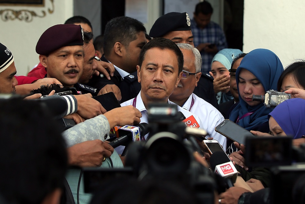 Election Commission chairman Azhar Azizan Harun speaks to the press outside the Brinchang police station where early voting is taking place in Cameron Highlands January 22, 2019. u00e2u20acu201d  Picture by Farhan Najib