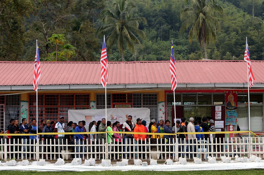 People wait in line to cast their votes at SK Menson in Cameron Highlands January 26, 2019. u00e2u20acu201d Picture by Farhan Najib