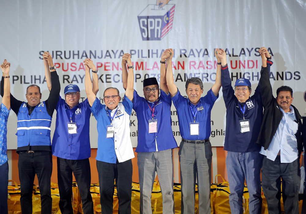 Barisan Nasional (BN) retained the Cameron Highlands parliamentary seat as Ramli Mohd Nor (centre) wins the by-election with a 3,238-vote majority January 26, 2019. u00e2u20acu201d Picture by Farhan Najib