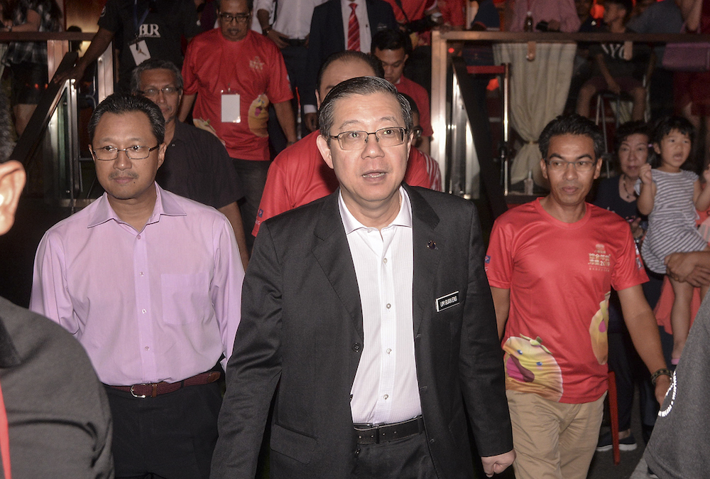 Finance Minister Lim Guan Eng arrives for the closing ceremony of 8TVu00e2u20acu2122s Chinese New Year Grand Bazaar at Bukit Jalil in Kuala Lumpur, January 30, 2019. u00e2u20acu201d Picture by Shafwan Zaidon