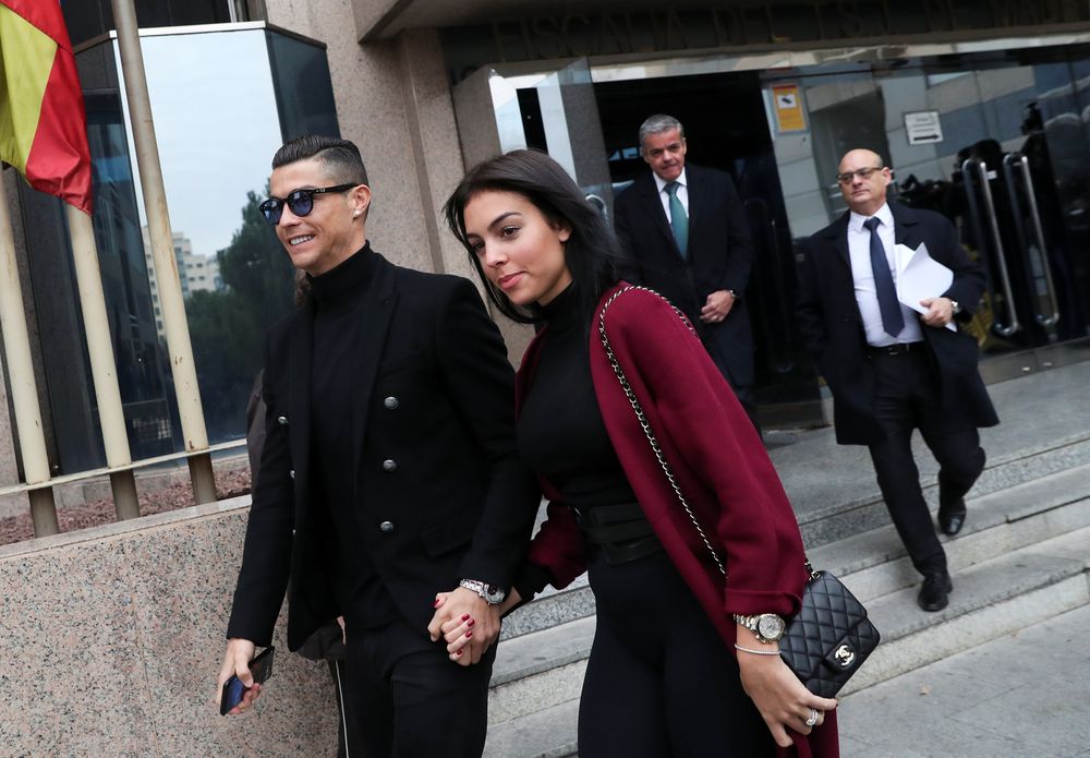 Portugalu00e2u20acu2122s football player Cristiano Ronaldo leaves with his girlfriend Georgina Rodriguez after appearing in court on a trial for tax fraud in Madrid, Spain, January 22, 2019. u00e2u20acu201d Reuters pic