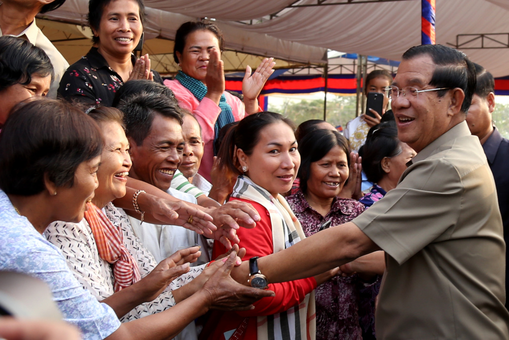 Cambodian Prime Minister Hun Sen greets people during a groundbreaking ceremony to build the third ring road in Phnom Penh on January 14, 2019. u00e2u20acu201d AFP pic