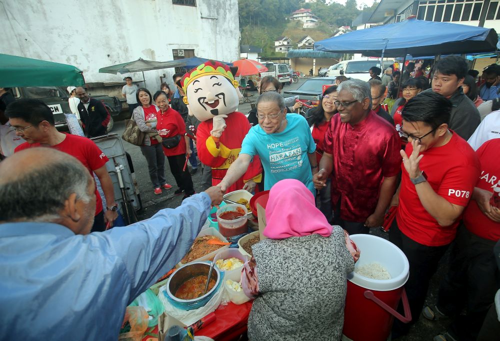 Pakatan Harapanu00e2u20acu2122s Cameron Highlands by-election candidate M. Manogaran and DAP adviser Lim Kit Siang campaign in Brinchang, Cameron Highlands January 24, 2019. u00e2u20acu201d Picture by Farhan Najib