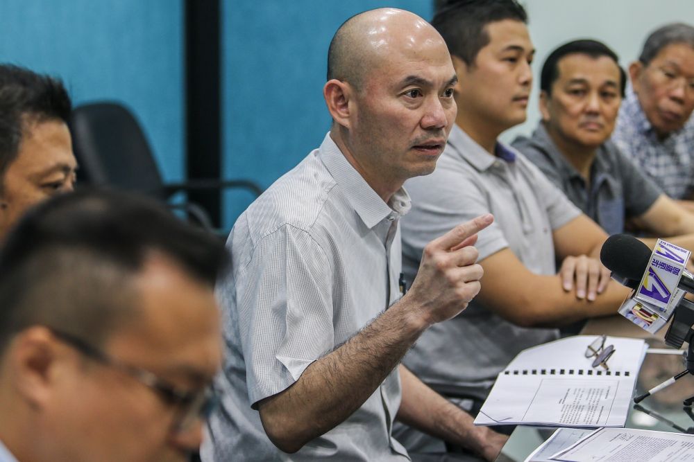 Kepong MP Lim Lip Eng (centre) speaks during the press conference at the DAP office in Kepong January 9, 2019. u00e2u20acu2022  Picture by Hari Anggara