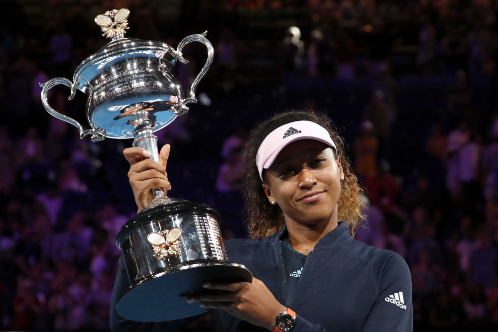 Japanu00e2u20acu2122s Naomi Osaka poses with her Australian Open trophy after winning her Womenu00e2u20acu2122s Singles Final match against Czech Republicu00e2u20acu2122s Petra Kvitova at Melbourne Park, Melbourne January 26, 2019. u00e2u20acu201d Reuters pic