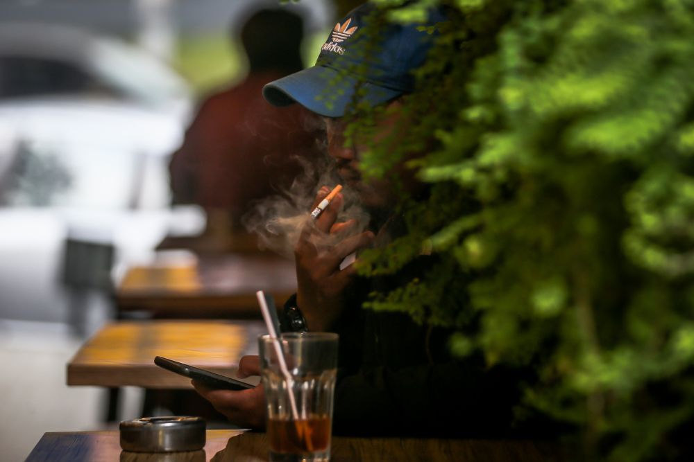 The new rules are still looking hazy to both restaurant operators and their patrons. u00e2u20acu2022 Picture by Hari Anggara