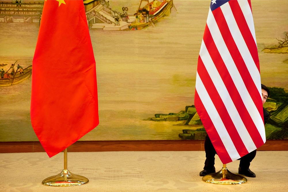 A US flag is tweaked ahead of a news conference between US Secretary of State John Kerry and Chinese Foreign Minister Wang Yi at the Ministry of Foreign Affairs in Beijing January 27, 2016. u00e2u20acu201d Reuters pic