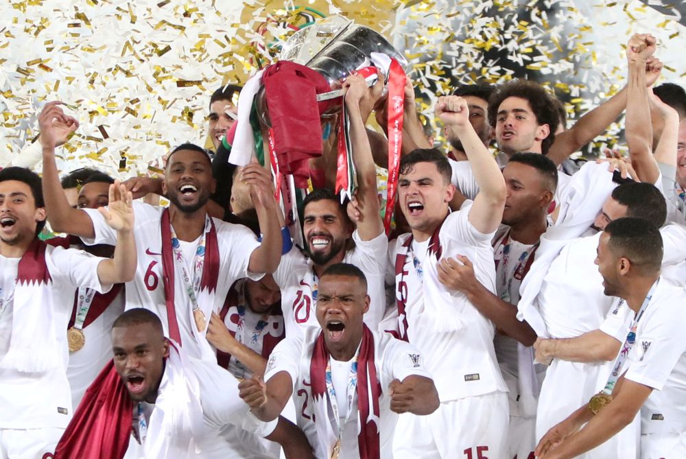 Qatar's Hasan Al Haydos lifts the trophy as they celebrate winning the Asian Cup against Japan, February 1, 2019. u00e2u20acu2022 Reuters pic