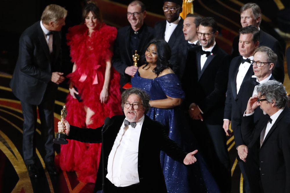 Producer Charles B. Wessler speaks onstage alongside cast and crew of u00e2u20acu02dcGreen Booku00e2u20acu2122 after the film won the Best Picture award at the 91st Academy Awards, February 25, 2019. u00e2u20acu2022 Reuters pic