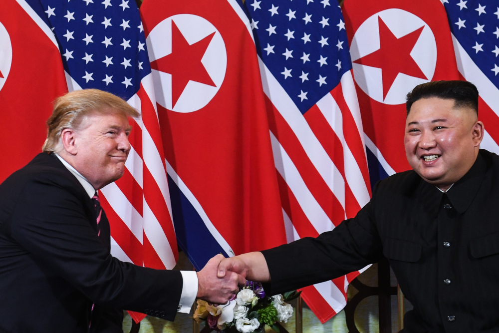 US President Donald Trump shakes hands with North Korea's leader Kim Jong-un following a meeting at the Sofitel Legend Metropole hotel in Hanoi on February 27, 2019. u00e2u20acu201d AFP pic 