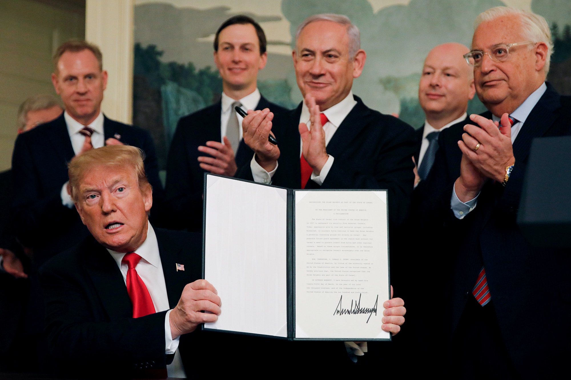 US President Donald Trump holds a proclamation recognising Israelu00e2u20acu2122s sovereignty over the Golan Heights as he is applauded by Israelu00e2u20acu2122s Prime Minister Benjamin Netanyahu and others at the White House in Washington, US, March 25, 2019. u00e2u20acu201d Reuters pic