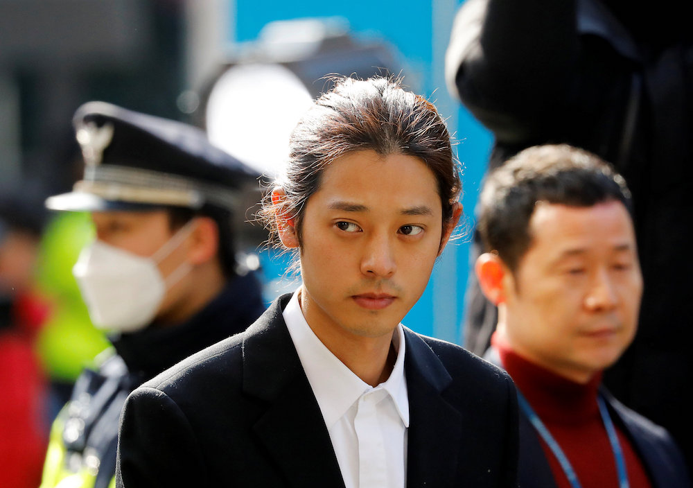 South Korean singer Jung Joon-young arrives for questioning on accusations of illicitly taping and sharing sex videos on social media, at the Seoul Metropolitan Police Agency in Seoul March 14, 2019. u00e2u20acu201d Reuters pic