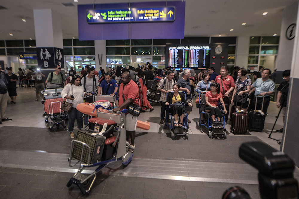Some of the Malaysian victims of the Lombok earthquake arrive at KLIA2 in Sepang March 19, 2019. u00e2u20acu201d Picture by Shafwan Zaidon