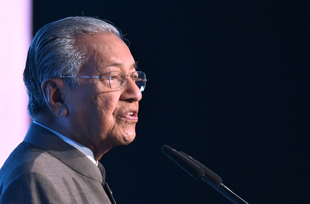 Prime Minister Tun Dr Mahathir Mohamad delivers his keynote speech at Invest Malaysia 2019 in Kuala Lumpur March 19, 2019. u00e2u20acu201d Bernama pic