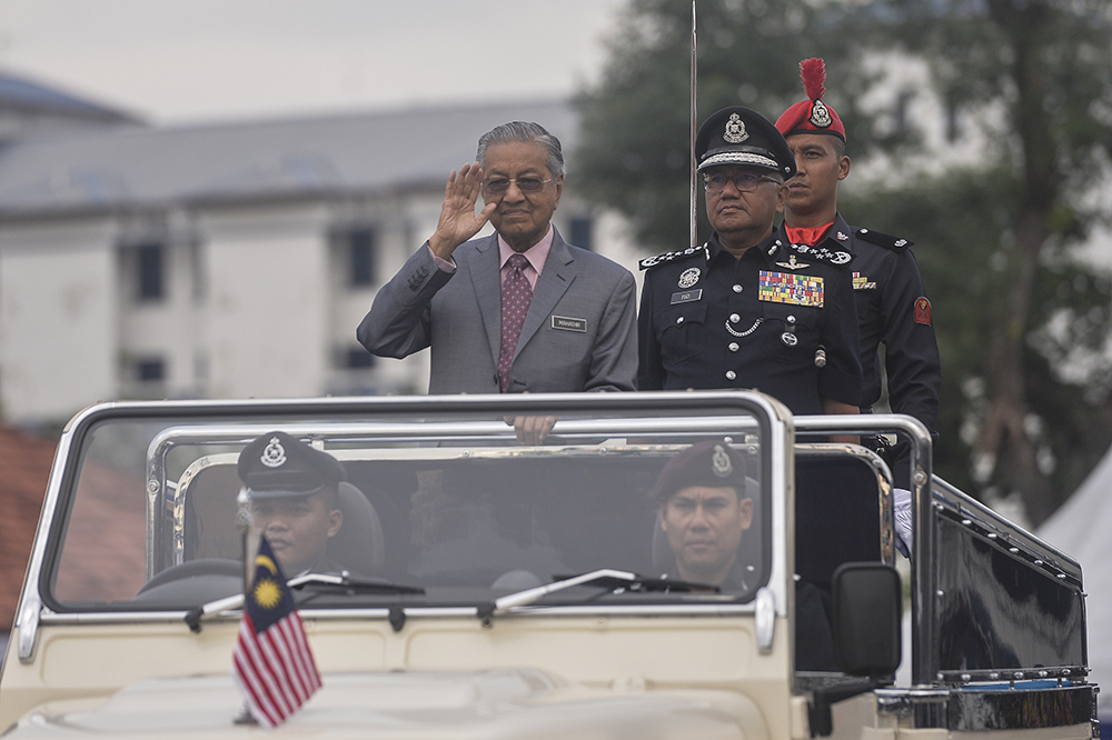 Prime Minister Tun Dr Mahathir Mohamad and IGP Tan Sri Mohamad Fuzi Harun attend the 212th Police Day Parade at the Police Training Centre (Pulapol) in Kuala Lumpur March 25, 2019. u00e2u20acu201d Picture by Miera Zulyana