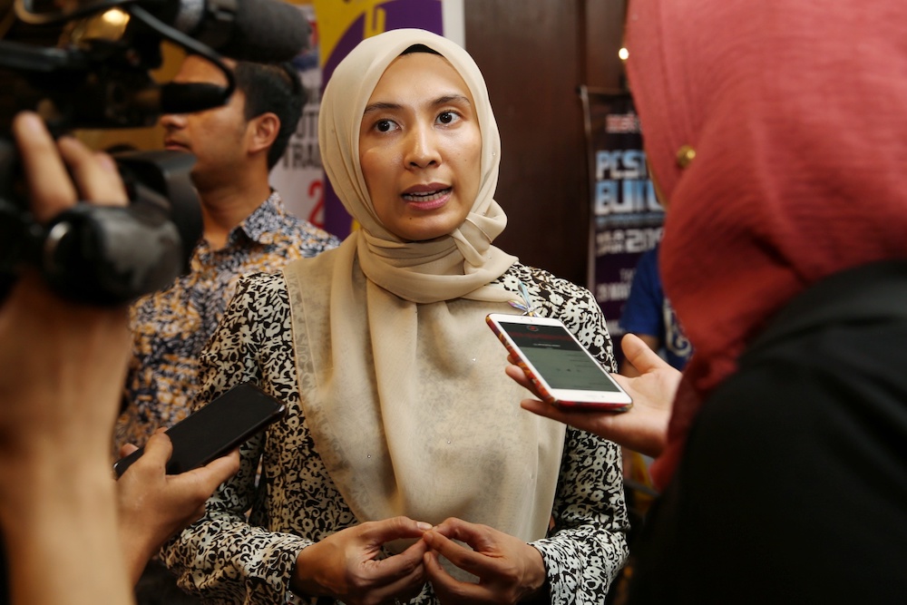 Nurul Izzah speaks to the media after the Abim Press book launch, March 31, 2019. u00e2u20acu201d Picture by Choo Choy May 