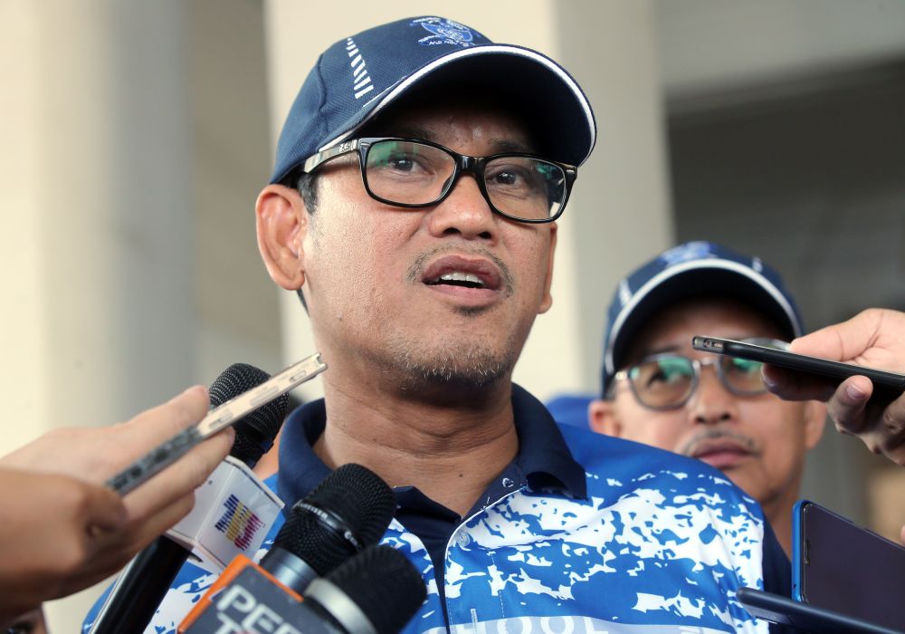 Perak Mentri Besar Datuk Seri Ahmad Faizal Azumu speaks to reporters during SMK Andersonu00e2u20acu2122s annual sports day in Ipoh March 15, 2019. u00e2u20acu201d Picture by Farhan Najib