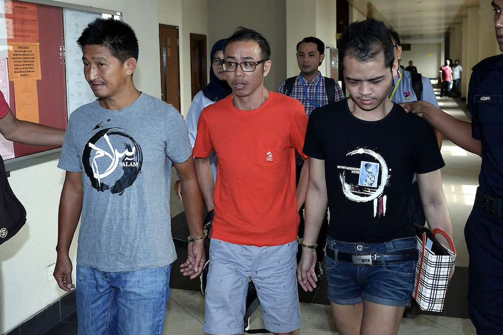 (From left) Mohamad Yazid Kong Abdullah, Chow Mun Fai and Danny Antoni leave the Sessions Court in Kuala Lumpur March 8, 2019. u00e2u20acu201d Bernama pic