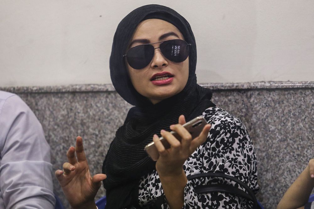 Ketari MP Young Syefura Othman arrives at the Kuala Lumpur Syariah Court for her divorce case on March 7, 2019. u00e2u20acu201d Picture by Hari Anggara