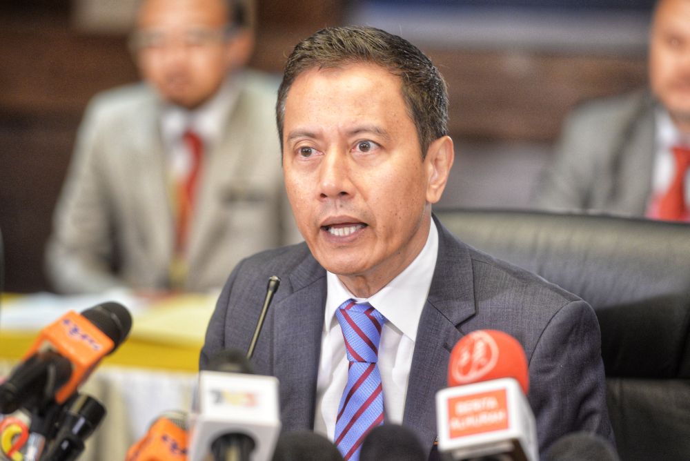 Election Commission chairman Azhar Azizan Harun speaks during a press conference on the Rantau by-election in Putrajaya March 6, 2019. u00e2u20acu2022 Picture by Shafwan Zaidon