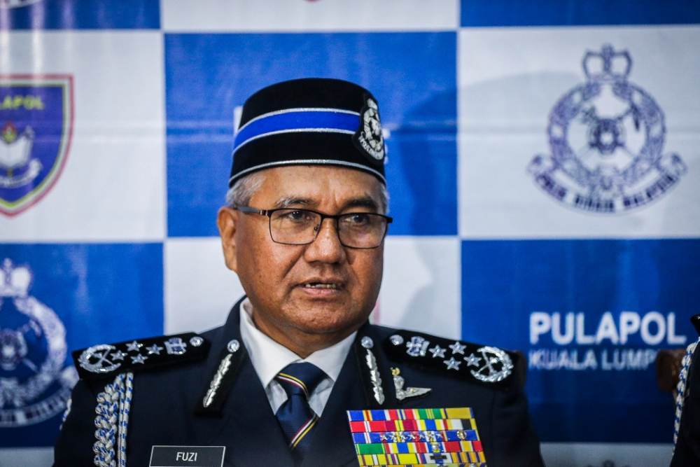 IGP Tan Sri Mohamad Fuzi Harun speaks during a press conference at Pulapol in Kuala Lumpur March 13, 2019. u00e2u20acu2022 Picture by Firdaus Latif
