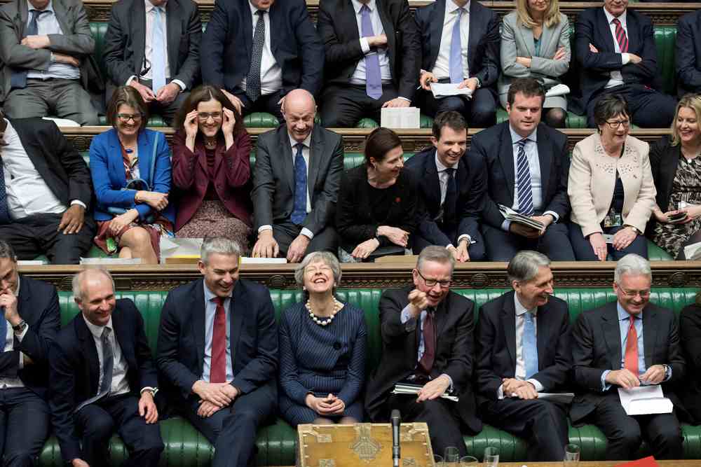 Britain's Prime Minister Theresa May (centre, front row) reacts during the debate on extending Brexit negotiating period in Parliament in London March 14, 2019. u00e2u20acu201d Reuters pic 