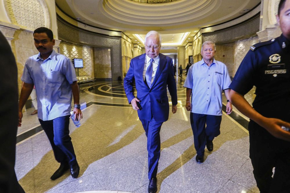 Datuk Seri Najib Razak is pictured leaving the court of appeal in Putrajaya March 11, 2019. u00e2u20acu201d Picture by Hari Anggara