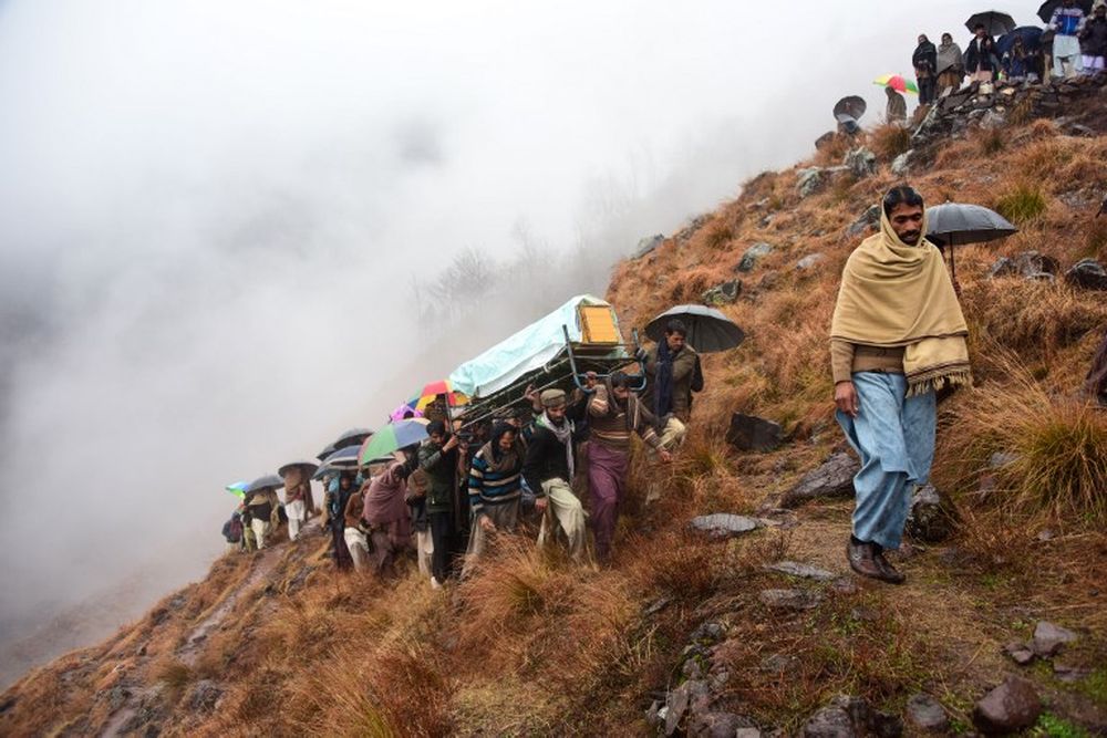 Pakistani Kashmiris carry the coffin of a civilian, who was killed in a gunfight between Indian and Pakistan troops on the Line of Control (LoC), at a funeral ceremony on the outskirts of Muzaffarabad on March 2, 2019. u00e2u20acu201d AFP pic