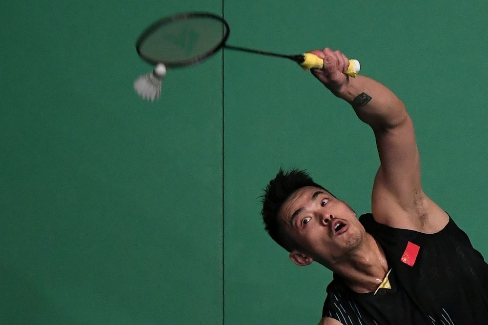 Chinau00e2u20acu2122s Lin Dan hits a return against Japanu00e2u20acu2122s Kanta Tsuneyama during their menu00e2u20acu2122s singles quarter-final match at the 2019 Malaysia Open badminton tournament in Kuala Lumpur April 5, 2019. u00e2u20acu201d AFP pic