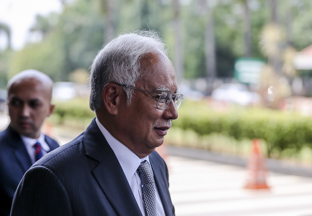 Former prime minister Datuk Seri Najib Razak leaves the Kuala Lumpur Court Complex April 15, 2019, as the court adjourns for lunch. u00e2u20acu201d Picture by Firdaus Latif 