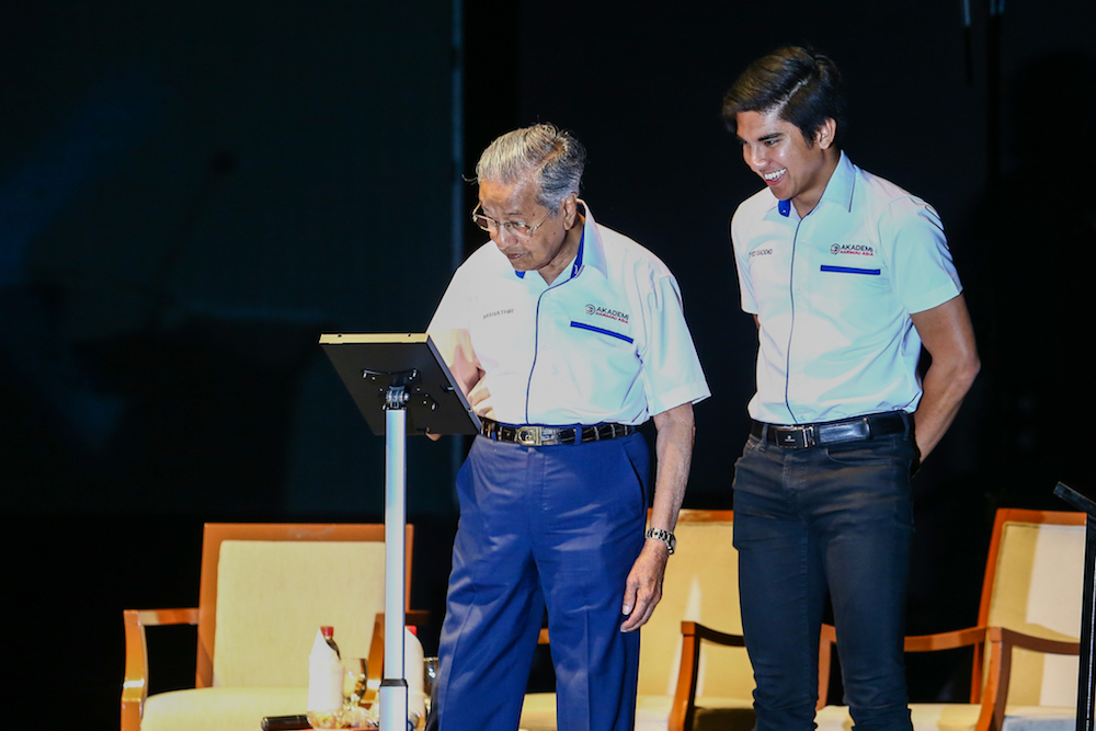 Prime Minister Tun Dr Mahathir Mohamad officiates the launch of the Asian Tiger Initiative at UiTM Shah Alam April 1, 2019, as Youth and Sports Minister Syed Saddiq Abdul Rahman looks on. u00e2u20acu201d Picture by Hari Anggara