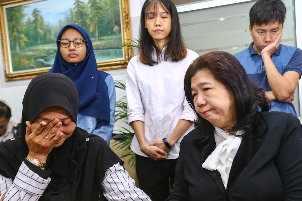 Norhayati Mohd Arifin and Susanna Liew attend the announcement of Suhakamu00e2u20acu2122s public inquiry findings into the disappearances of pastor Raymond Koh and Amri Che Mat in Kuala Lumpur April 3, 2019. u00e2u20acu201d Picture by Hari Anggara