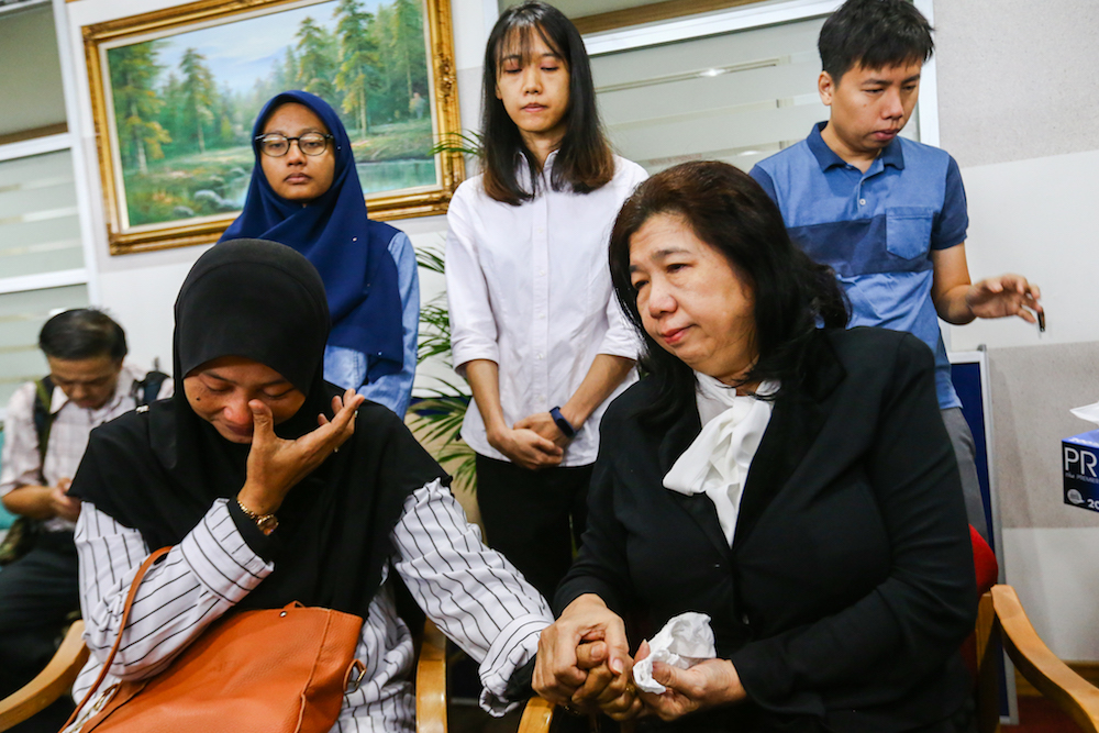 Norhayati Mohd Arifin and Susanna Liew attend the announcement of Suhakamu00e2u20acu2122s public inquiry findings into the disappearances of pastor Raymond Koh and Amri Che Mat in Kuala Lumpur April 3, 2019. u00e2u20acu201d Picture by Hari Anggara