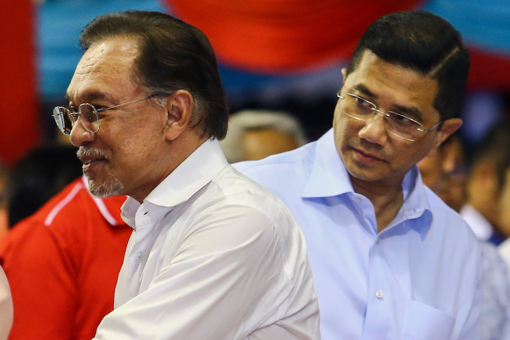 Datuk Seri Anwar Ibrahim and Datuk Seri Azmin Ali attend PKRu00e2u20acu2122s 20th anniversary celebrations at Dataran Rantau, Negri Sembilan April 4, 2019. u00e2u20acu201d Picture by Hari Anggara