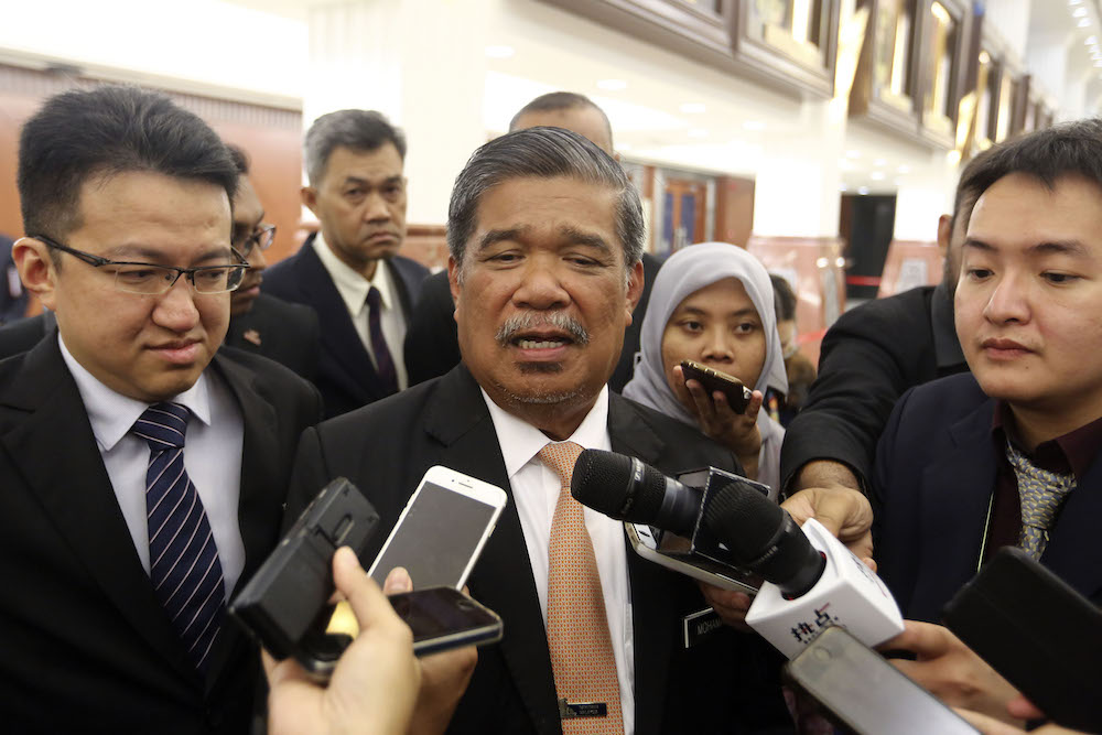 Defence Minister Mohamad Sabu speaks to reporters in Parliament April 4, 2019. u00e2u20acu201d Picture by Yusof Mat Isa