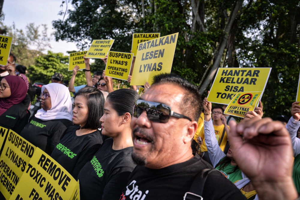 Anti-Lynas demonstrators rally in front of Parliament compound in Kuala Lumpur April 10, 2019. u00e2u20acu201d Picture by Shafwan Zaidon